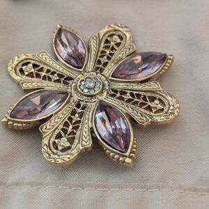 Gold-Tone Floral Brooch with Light Purple Crystals